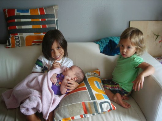Yes... a cute baby and kiddos... but these are the geometric/modern pillows i was describing
